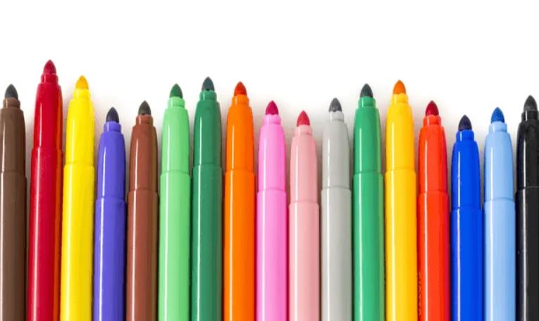 Essential supplies for beginner colorists using markers